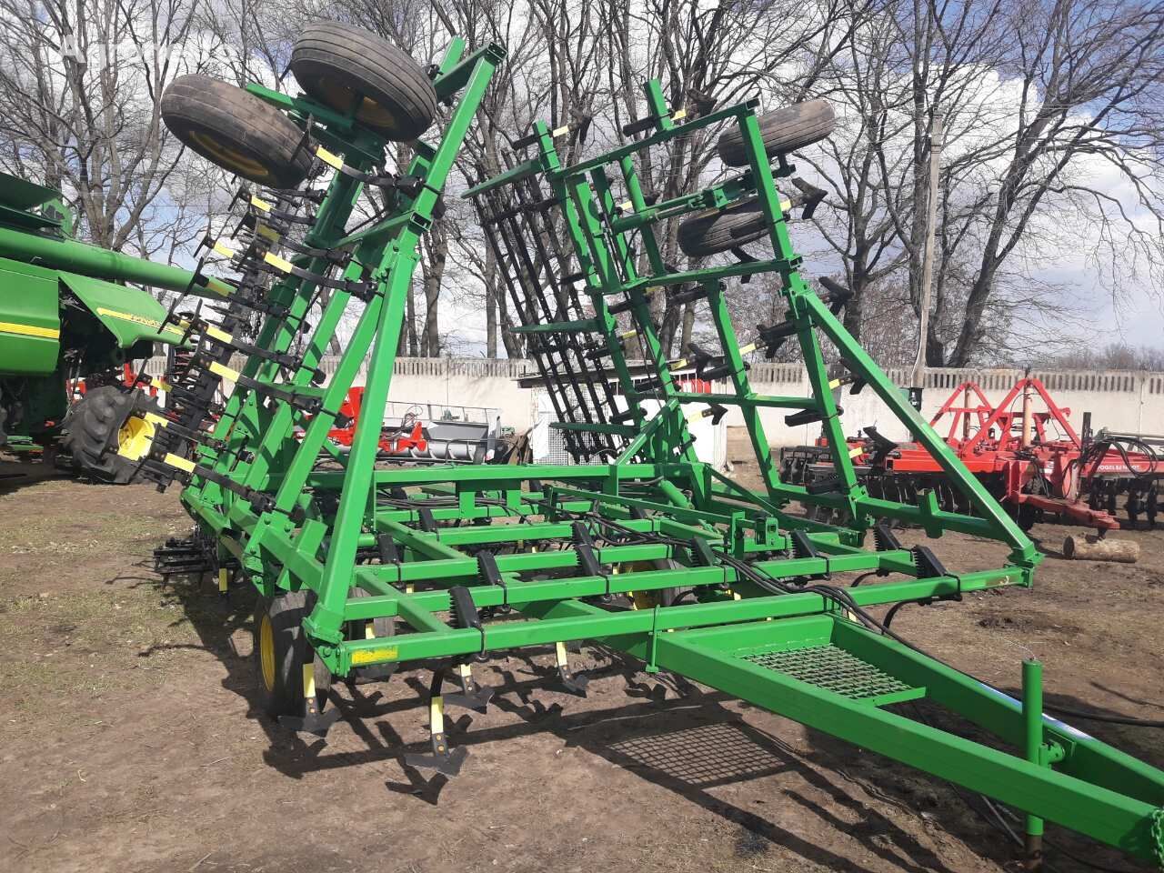 John Deere 960  9,5m pod 190l.s.  kultivator